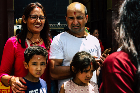 Kathmandu Nepal August 27, 2018 View of unknowns Hindu people visiting the Pashupatinath temple in the morningのeditorial素材