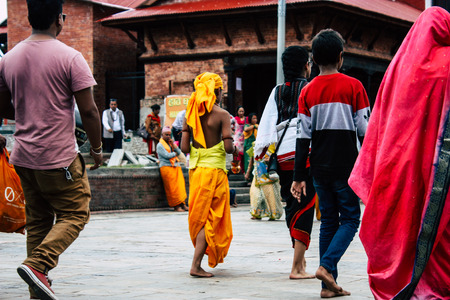 Kathmandu Nepal August 27, 2018 View of unknowns Hindu people visiting the Pashupatinath temple in the morningのeditorial素材