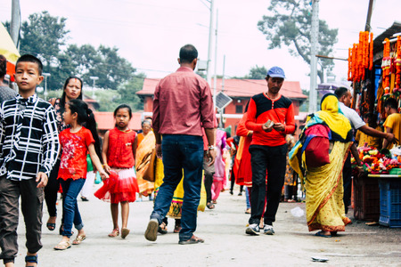 Kathmandu Nepal August 27, 2018 View of unknowns people walking to the entry of the Pashupatinath temple in the morningのeditorial素材