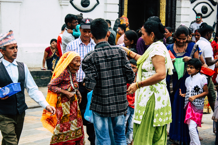 Kathmandu Nepal August 27, 2018 View of unknowns Hindu people visiting the Pashupatinath temple in the morningのeditorial素材