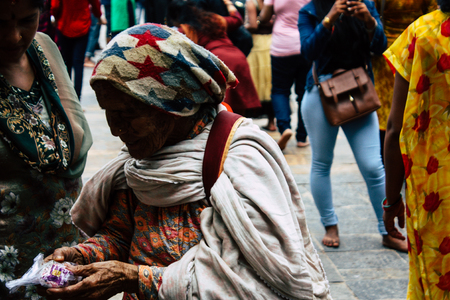 Kathmandu Nepal August 27, 2018 View of unknowns Hindu people visiting the Pashupatinath temple in the morningのeditorial素材