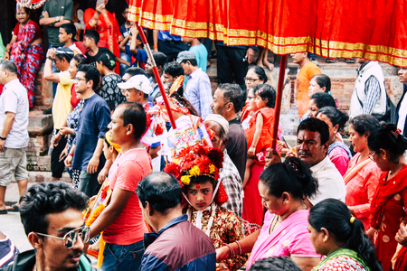 Kathmandu Nepal August 27, 2018 View of unknowns Hindu people attending a religious ceremony at the Pashupatinath temple in the morningのeditorial素材