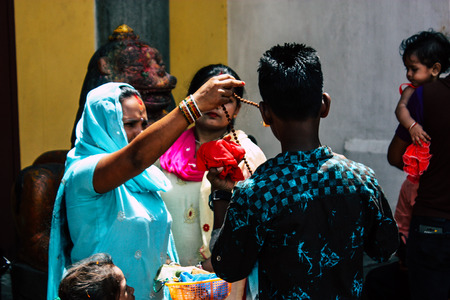 Kathmandu Nepal August 27, 2018 View of unknowns Hindu people visiting the Pashupatinath temple in the morningのeditorial素材
