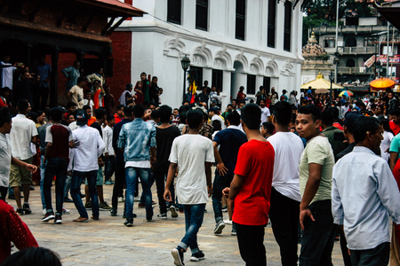 Kathmandu Nepal August 27, 2018 View of young unknowns people attending a religious ceremony where they must run in front of the Hindu demons at the Pashupatinath temple in the morningのeditorial素材