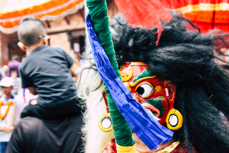 Kathmandu Nepal August 27, 2018 View of young unknowns people attending a religious ceremony where they must run in front of the Hindu demons at the Pashupatinath temple in the morningのeditorial素材