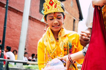 Kathmandu Nepal August 27, 2018 View of unknowns Hindu people attending a religious ceremony with a holy cow at the Pashupatinath temple in the morningのeditorial素材