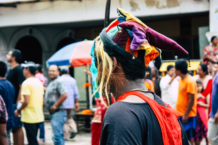 Kathmandu Nepal August 27, 2018 View of young unknowns people attending a religious ceremony where they must run in front of the Hindu demons at the Pashupatinath temple in the morningのeditorial素材