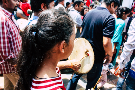 View of unknowns Hindu people playing music at the Pashupatinath temple in the morningのeditorial素材