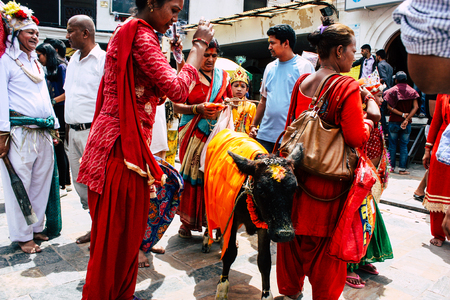 Kathmandu Nepal August 27, 2018 View of unknowns Hindu people attending a religious ceremony with a...