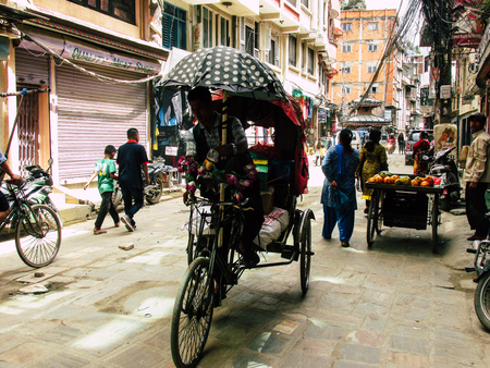 Kathmandu Nepal August 31, 2018 View of a unknown Nepali people driving a local touk touk at Thamel...