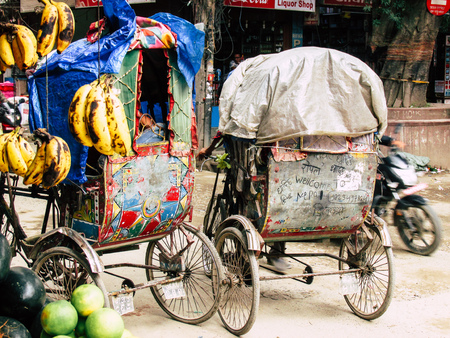 Kathmandu Nepal August 31, 2018 View of a unknown Nepali people driving a local touk touk at Thamel district in Kathmandu in the afternoonのeditorial素材