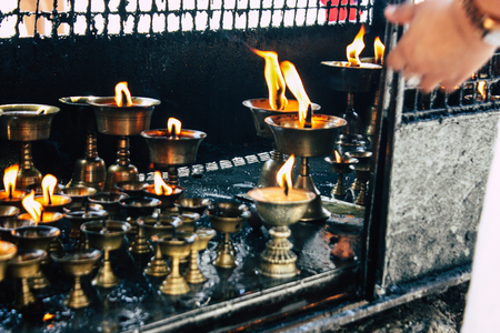 Kathmandu Nepal September 1, 2018 Closeup of candles burning front a temple at Durbar square in Kathmandu in the morningのeditorial素材