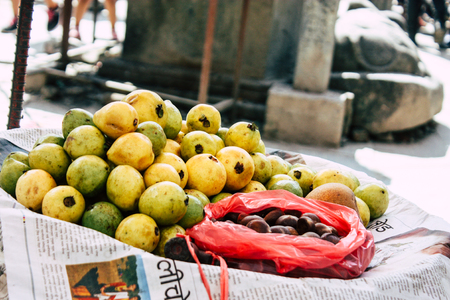 Kathmandu Nepal September 1, 2018 Closeup of a unknown Nepali people selling fruits at the street vegetable market in Chhetrapati square Kathmandu in the morningのeditorial素材