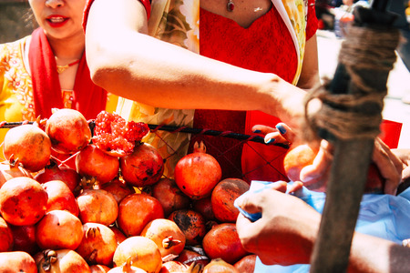 Kathmandu Nepal September 1, 2018 Closeup of a hand of unknown Nepali people selling fruits at the street vegetable market in Chhetrapati square Kathmandu in the morningのeditorial素材