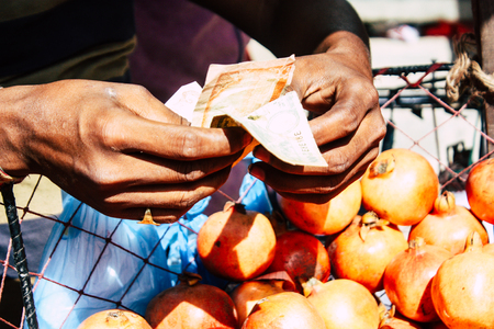 Kathmandu Nepal September 1, 2018 Closeup of a hand of unknown Nepali people selling fruits at the street vegetable market in Chhetrapati square Kathmandu in the morningのeditorial素材