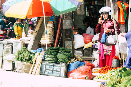 Kathmandu Nepal September 1, 2018 Closeup of a unknown Nepali people selling vegetables at the street vegetable market in Chhetrapati square in the morningのeditorial素材