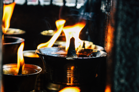 Kathmandu Nepal September 1, 2018 Closeup of candles burning front a temple at Durbar square in Kathmandu in the morningのeditorial素材