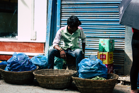 Kathmandu Nepal September 1, 2018 Closeup of a unknown Nepali people selling vegetables at the street vegetable market in Chhetrapati square in the morningのeditorial素材