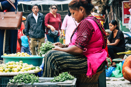 Kathmandu Nepal September 1, 2018 Closeup of a unknown Nepali people selling vegetables at the street vegetable market in Chhetrapati square in the morningのeditorial素材