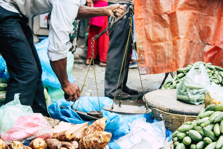 Kathmandu Nepal September 1, 2018 Closeup of a unknown Nepali people selling vegetables at the street vegetable market in Chhetrapati square in the morningのeditorial素材