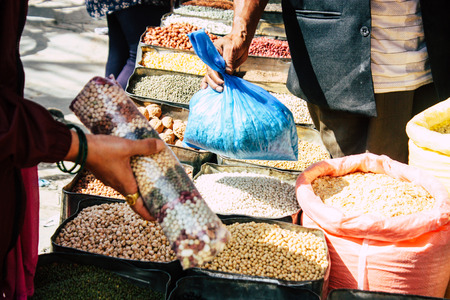 Kathmandu Nepal September 1, 2018 Closeup of a hand of a unknown Nepali people selling vegetables at the street vegetable market in Chhetrapati square in the morningのeditorial素材