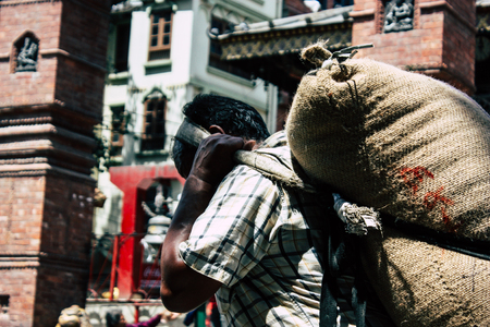 Kathmandu Nepal September 1, 2018 View of traditional Nepali porter walking in the street of Kathmandu in Nepalのeditorial素材