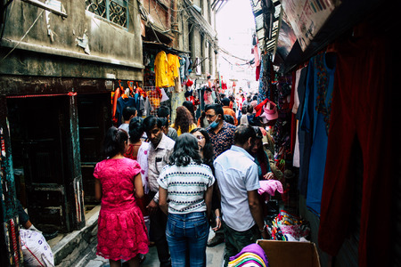 Kathmandu Nepal September 1, 2018 View of unknowns Nepali people walking and shopping in a narrow...
