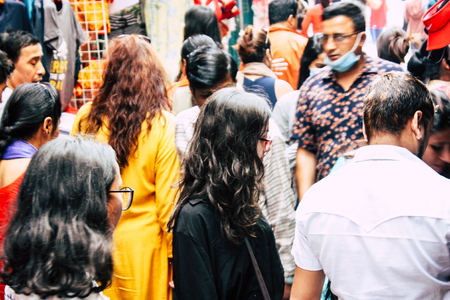 Kathmandu Nepal September 1, 2018 View of unknowns Nepali people walking and shopping in a narrow...