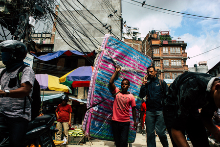 Kathmandu Nepal September 1, 2018 View of traditional Nepali porter walking in the street of Kathmandu in Nepalのeditorial素材