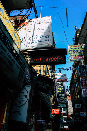 Kathmandu Nepal September 5, 2018 Closeup of advertising signs for commercial establishments located on Thamel Street in Kathmandu in the afternoonのeditorial素材
