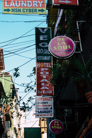 Kathmandu Nepal September 5, 2018 Closeup of advertising signs for commercial establishments located on Thamel Street in Kathmandu in the afternoonのeditorial素材
