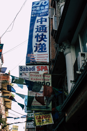 Kathmandu Nepal September 5, 2018 Closeup of advertising signs for commercial establishments located on Thamel Street in Kathmandu in the afternoonのeditorial素材