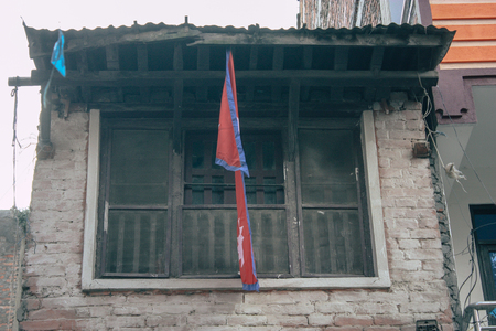 Kathmandu Nepal September 8, 2018 View of the facade of a traditional Nepalese building in the streets of Kathmandu in the eveningのeditorial素材