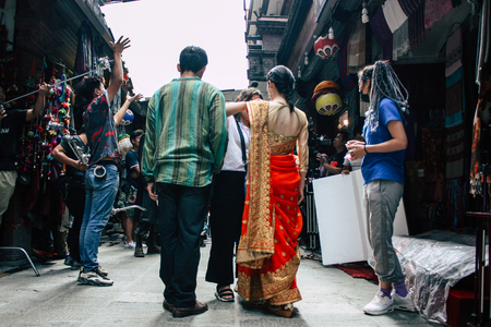 Kathmandu Nepal September 7, 2018 View of the actors makeup team of a Chinese action film of which certain shots are made in the neighborhood of Thamel in Kathmandu in the morningのeditorial素材