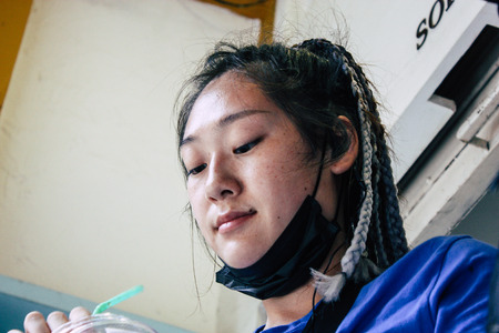 Kathmandu Nepal September 7, 2018 View of the actors makeup team of a Chinese action film of which certain shots are made in the neighborhood of Thamel in Kathmandu in the morningのeditorial素材