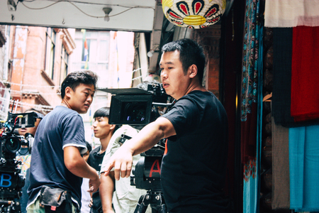 Kathmandu Nepal September 7, 2018 View of the setting of the camera by the technical team for an action scene of a Chinese movie shot in the Thamel district of Kathmandu in the afternoonのeditorial素材