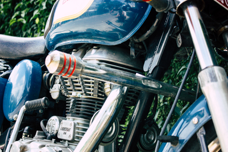 Pokhara Nepal September 12, 2018 Closeup of a Royal Enfield motorcycle parked in the street of Pokhara in the afternoonのeditorial素材