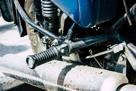 Pokhara Nepal September 12, 2018 Closeup of a Royal Enfield motorcycle parked in the street of Pokhara in the afternoonのeditorial素材