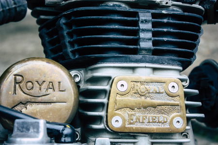 Nepal Pokhara September 12, 2018 Closeup of a Royal Enfield motorcycle parked in the street of...