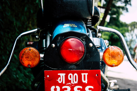 Pokhara Nepal September 12, 2018 Closeup of a Royal Enfield motorcycle parked in the street of Pokhara in the afternoonのeditorial素材