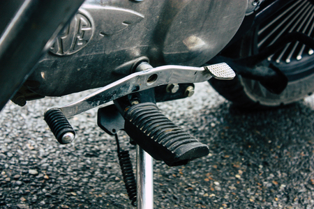Nepal Pokhara September 12, 2018 Closeup of a Royal Enfield motorcycle parked in the street of Pokhara in the afternoonのeditorial素材