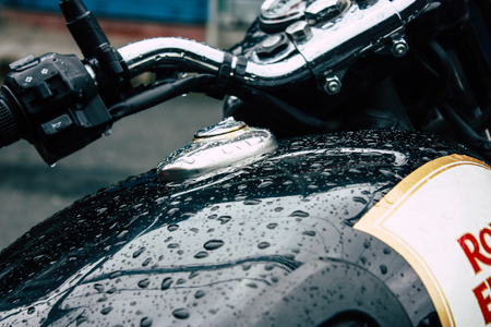 Nepal Pokhara September 12, 2018 Closeup of a Royal Enfield motorcycle parked in the street of Pokhara in the afternoonのeditorial素材