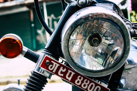 Pokhara Nepal September 12, 2018 Closeup of a Royal Enfield motorcycle parked in the street of Pokhara in the afternoonのeditorial素材
