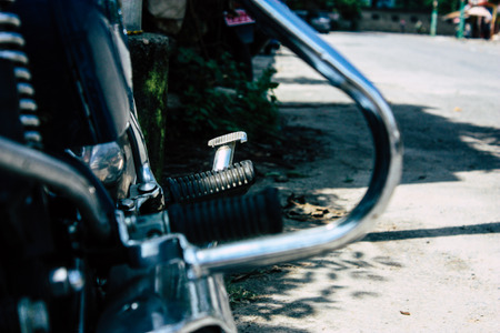 Pokhara Nepal September 12, 2018 Closeup of a Royal Enfield motorcycle parked in the street of Pokhara in the afternoonのeditorial素材