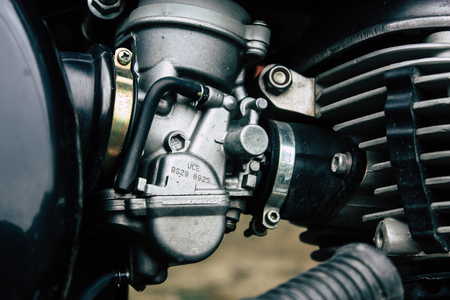 Nepal Pokhara September 12, 2018 Closeup of a Royal Enfield motorcycle parked in the street of Pokhara in the afternoonのeditorial素材