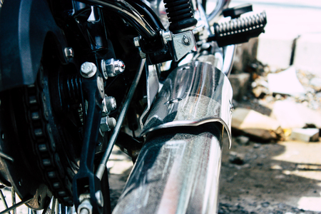 Pokhara Nepal September 12, 2018 Closeup of a Royal Enfield motorcycle parked in the street of Pokhara in the afternoonのeditorial素材