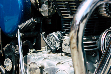 Pokhara Nepal September 12, 2018 Closeup of a Royal Enfield motorcycle parked in the street of Pokhara in the afternoonのeditorial素材