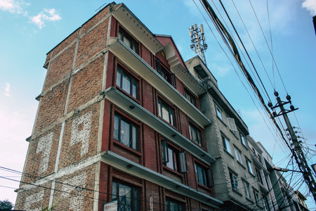Kathmandu Nepal September 8, 2018 View of the facade of a traditional Nepalese building in the streets of Kathmandu in the eveningのeditorial素材