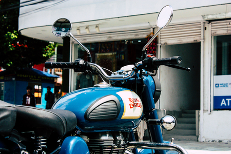 Pokhara Nepal September 12, 2018 Closeup of a Royal Enfield motorcycle parked in the street of Pokhara in the afternoonのeditorial素材