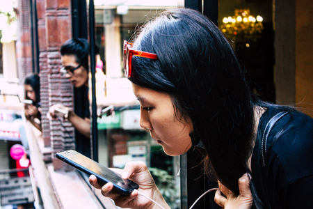 Kathmandu Nepal September 13, 2018 Portrait of unknown Nepalese people walking in the street of Kathmandu in the afternoonのeditorial素材